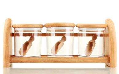 Foto op Canvas empty glass jars for spices with spoons © Africa Studio