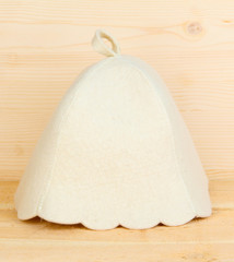 Sauna hat on wooden background