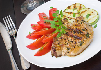 Hearty pork steak with vegetables