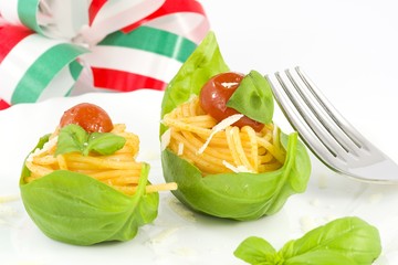 Italian cuisine, spaghetti with tomato and basil