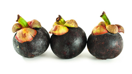 Closeup of  3 mangosteen isolated