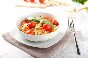 Pasta with tomatoes and basil