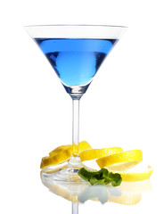 Blue cocktail in martini glass isolated on white