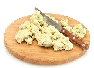 Fresh cauliflower and knife on cutting board isolated on white