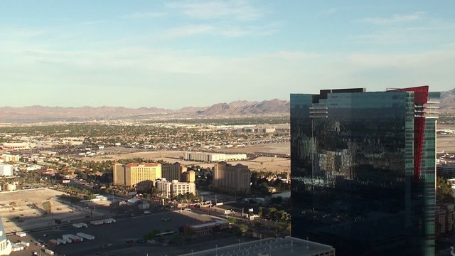 Outskirts of Las Vegas. Bird's-eye view. Plane taking off.