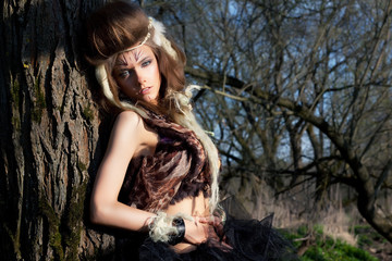 Portrait of romantic woman in fairy forest. Renaissance style