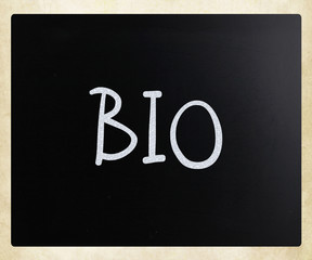 "Bio" handwritten with white chalk on a blackboard