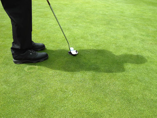 golfeur sur un green