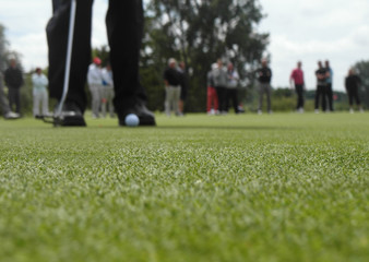 Obraz premium golfeur sur un green