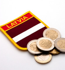 latvia flag and euro coins