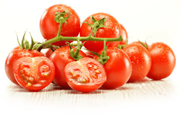 Fresh raw tomatoes isolated on white