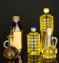 Olive and sunflower oil in the bottles and small decanters