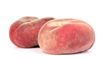 ripe fig peaches isolated on white.