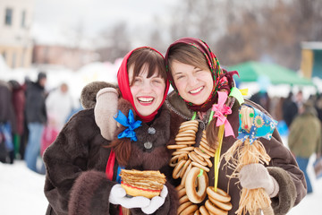 girls with pancake during  Shrovetide