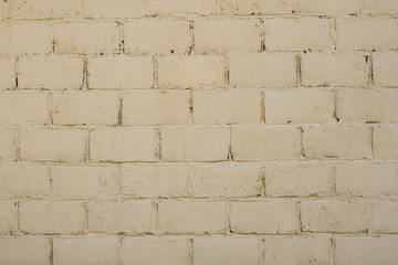 Fototapeta premium Beige brick wall - use as background