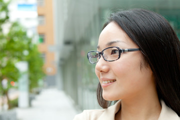 Beautiful business woman outdoor. Portrait of asian.