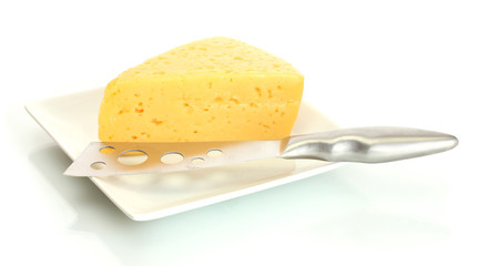 tasty cheese and knife on plate isolated on white