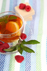 Tea with raspberries and mint