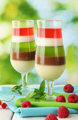 fruit jelly in glasses, berries and mint