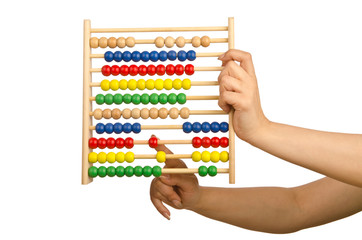 Hand holding abacus on white