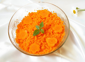 Carrot salad with menta leaves and different shapes of carrot