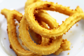 Churros gastronomic scene highlighting breakfast