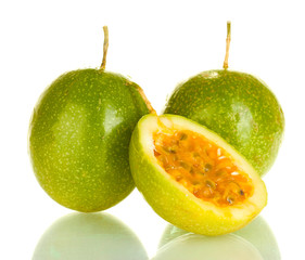 Naklejka na ściany i meble green passion fruit isolated on white background close-up