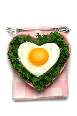 Sandwich with fired egg sunny side up, heart shaped