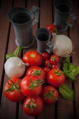 Onions and Tomatoes on wood table