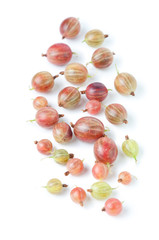Vertical shot of ripe gooseberries, isolated over white