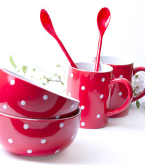 Red polka dot bowls, cups and spoons