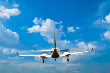 Airplane flying with blue sky