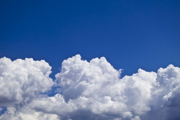 Plakat white fluffy clouds over blue sky landscape