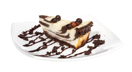 cheesecake with chocolate sauce.