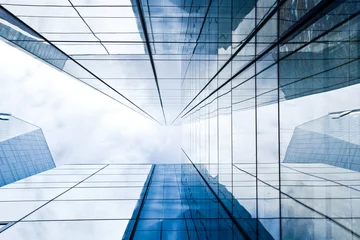 Poster moderne wolkenkrabber met reflectie - kantoren © Tiberius Gracchus