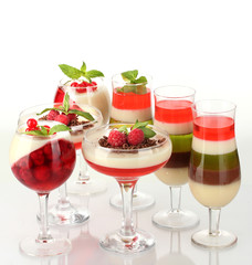fruit jelly with chocolate and pberries in glasses isolated