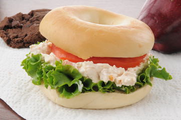 Closeup of a chicken salad bagel sandwich