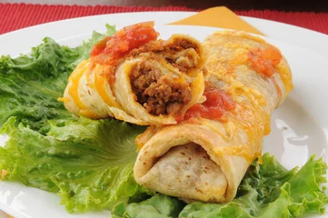 Fototapete Closeup of beef and bean chimichangas © MSPhotographic