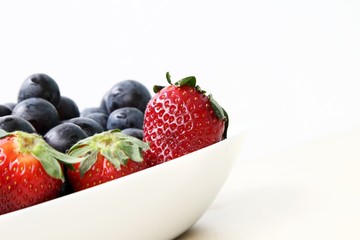 Detail with a strawberry in a dish