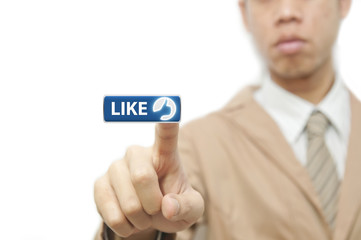 Business man press finger on blue like button
