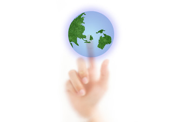 man finger pressing a touchscreen button to world map