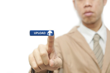 Business man press finger on green upload button
