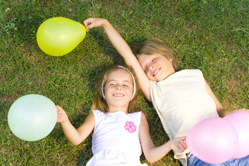 Fototapeta na wymiar happy children with balloons