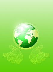 Hands holding a green earth