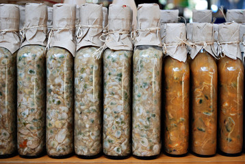 Bottled Spices Being Sold in a Marketplace