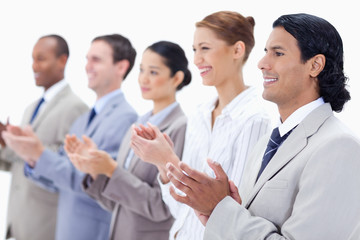 Close-up of  happy business people applauding