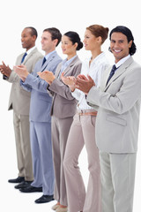 Obraz premium Business team smiling and applauding