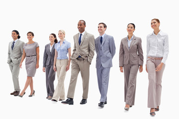 Obraz premium Happy business team walking