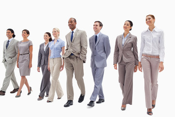 Fototapeta premium Smiling business team walking