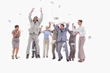 Obraz premium Very happy people with money falling from the sky